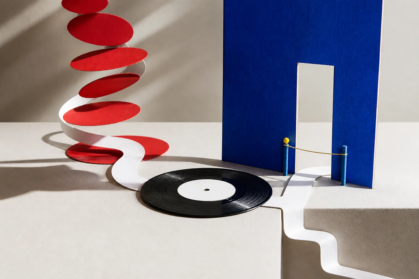 Modernist still life of one record between a popularity stack and a separate eligibility gate